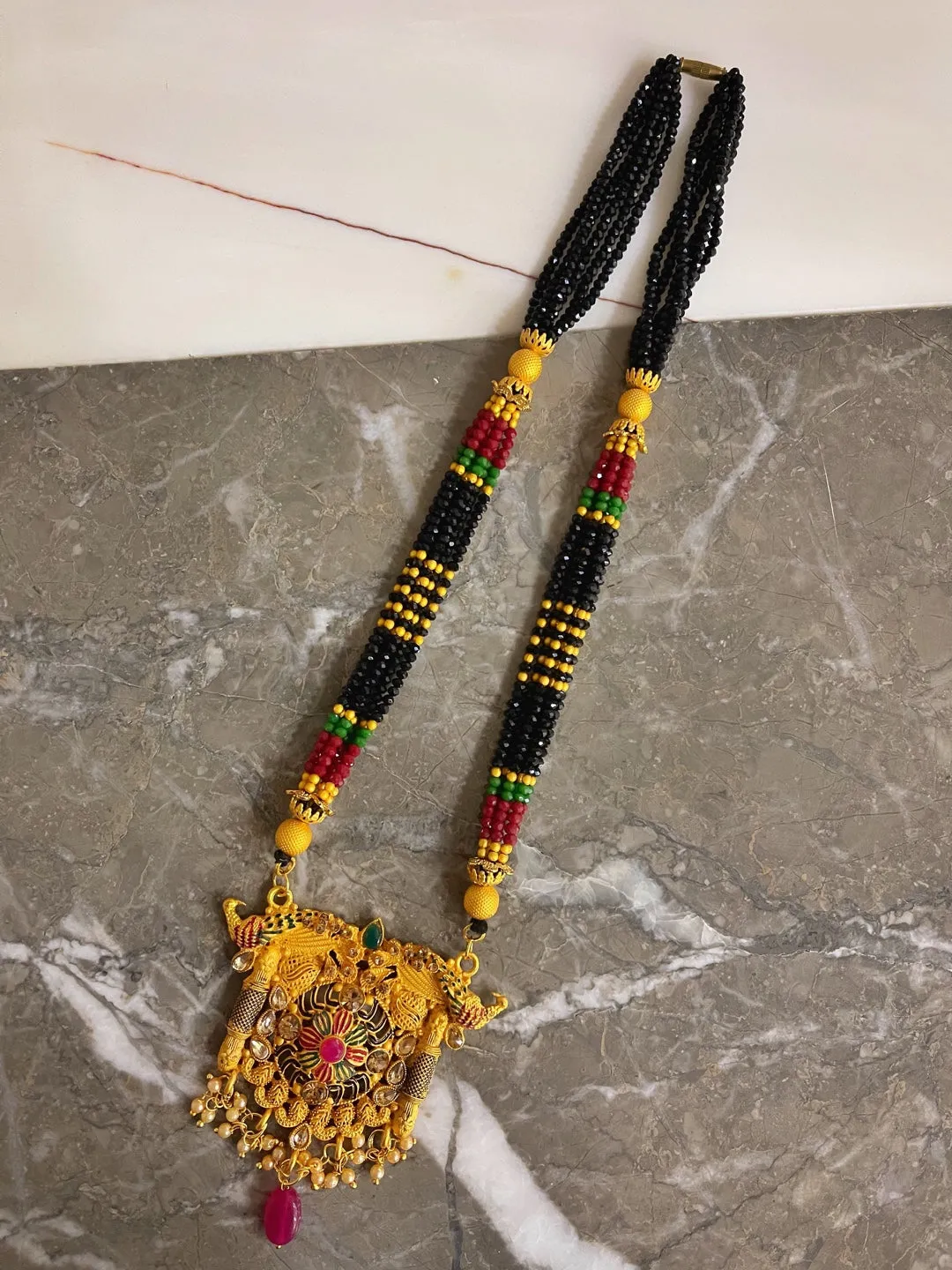 Long Mangalsutra Designs Gold Plated Stone Studded Peacock Shape Pendant with Pearls & Crystal Beads
